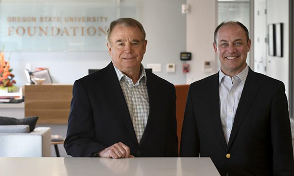 Oregon State University Foundation President and CEO Mike Goodwin, left, and Executive Vice President Shawn Scoville pose at the foundation's office in Corvallis. Goodwin is retiring Jan. 3, and Scoville has been announced as his successor.