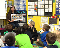 A Yamhill County 4-H Ambassador shares the book with a McMinnville classroom.