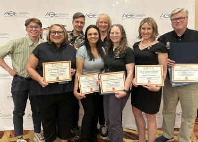 Members of the OSU Extension Communications office Henry Carnell (from left), LeAnn Locher, Alan Dennis, Diana Reyes, Ann Marie Murphy, Janet Donnelly and Jennifer Alexander pose with awards at the ACE Conference in Salt Lake City. (OSU Extension Comms)