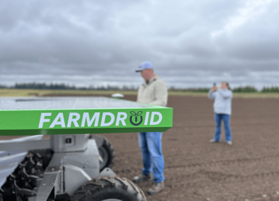 The FarmDroid is an innovative solar-powered Danish agricultural technology that can can seed, weed and spot-spray fields based on a pattern established by its own software.  Credit: Henry Carnell