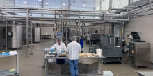 workers in the creamery processing center. Credit: Chris Branam 